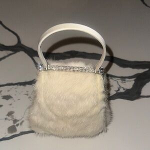 Judith Leiber Ivory Fur Wristlet with Silver Details